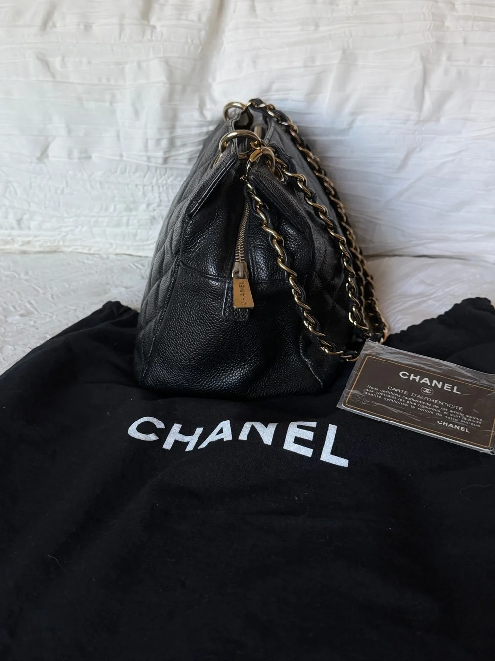CHANEL Black Quilted Caviar Leather Petite Timeless Shoulder Bag with Gold Chain